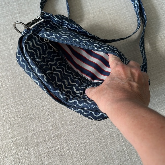 Lightly used Lug Carousel crossbody bag. Adjustable strap expands up to 26”. - Picture 4 of 6